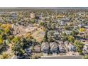 Wide shot of the property and surrounding neighborhood from above at 921 Raleigh St, Denver, CO 80204