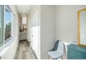 Bright and airy entryway with coat closet and view to living space at 921 Raleigh St, Denver, CO 80204