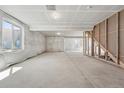 Unfinished basement with insulated walls, ready for customization and future living space at 17196 W 92Nd Loop, Arvada, CO 80007