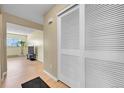 Bright hallway with hardwood floors, closet and open view at 4066 S Atchison Way # 102, Aurora, CO 80014