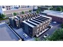 Aerial view showcasing modern townhomes with private garages and contemporary design at 1642 N Lafayette St # 2, Denver, CO 80218