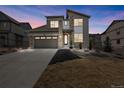 Well-maintained two-story home with stone facade and inviting curb appeal at 8290 Superior Cir, Littleton, CO 80125