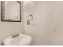 Small bathroom with updated vanity and fixtures at 1839 Grove St, Denver, CO 80204