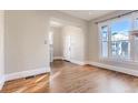 Spacious dining area with hardwood floors and large windows at 1839 Grove St, Denver, CO 80204