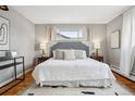 Cozy main bedroom features a comfortable bed, and neutral tones at 2930 S Birch St, Denver, CO 80222