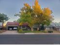 A charming single-Gathering home with well-kept lawn, and a two-car garage for storage or parking at 14867 E Harvard Ave, Aurora, CO 80014