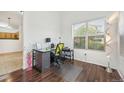 Cozy home office with wood floors, a view of other spaces and natural light at 2502 S Bahama Cir # B, Aurora, CO 80013