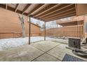 Covered patio with concrete flooring and fenced in backyard, perfect for outdoor living at 45 Wright Ct, Lakewood, CO 80228