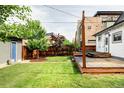 Backyard with spacious lawn and deck at 4421 Raleigh St, Denver, CO 80212