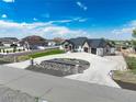 Attractive home featuring stone accents, meticulous landscaping, and circular driveway at 29585 E 165Th Ave, Brighton, CO 80603