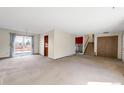 Spacious living room with a sliding door to the outdoor space at 4121 S Andes Way, Aurora, CO 80013