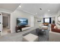 Spacious finished basement with ample seating, a pool table, and neutral décor at 12762 Fisher St, Englewood, CO 80112