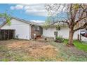 Spacious backyard featuring a wood-chip ground cover and a comfortable seating area at 18830 E 16Th Pl, Aurora, CO 80011