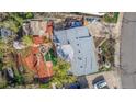 Aerial view of the property, showing the layout, roof, backyard features, and surrounding neighborhood at 15785 W Second Ave, Golden, CO 80401