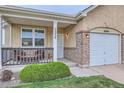 Cozy front porch with outdoor seating, perfect for relaxing and enjoying the neighborhood at 1335 Villa Grv # 30, Monument, CO 80132