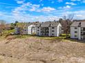 Exterior view of three-story condos, showcasing building designs at 13093 W Cedar Dr # 322, Lakewood, CO 80228