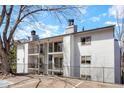 Charming apartment complex featuring balconies, well-maintained landscaping, and ample parking at 13093 W Cedar Dr # 322, Lakewood, CO 80228