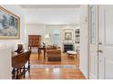 Bright living room with hardwood floors, fireplace, and a cozy seating area for entertaining at 335 Josephine St # D, Denver, CO 80206