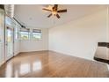Bright living area featuring hardwood floors and natural light at 1313 S Clarkson St # 205, Denver, CO 80210