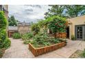 Private backyard with garden, patio, and pergola at 2533 E 11Th Ave # 1, Denver, CO 80206