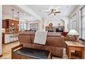 Open living room with a fireplace and built-in shelving at 5723 S Union Ct, Littleton, CO 80127