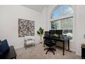 Inviting office space featuring plush carpet, a picture window, and neutral walls at 810 Trail Ridge Dr, Louisville, CO 80027