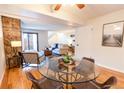 Cozy living and dining areas with hardwood floors and natural light at 6420 E Bates Ave, Denver, CO 80222