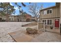 Condo with a welcoming front entrance and well-maintained landscaping at 857 S Van Gordon Ct # H101, Lakewood, CO 80228