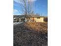 Ranch style home with attached garage and large yard at 4670 Independence St, Wheat Ridge, CO 80033