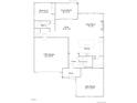 Layout displaying the first floor of the home with a kitchen, great room, garage and covered deck at 630 Sunrise St, Erie, CO 80516