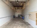 The inside of the unit features metal walls and ceiling with room for storage at 7152 S Blackhawk St # C12, Englewood, CO 80112