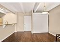 Bright living room featuring hardwood floors and a cozy layout at 1365 Columbine St # 403, Denver, CO 80206