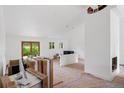 Bright living room features natural light, fireplace, and open floor plan ready for personalized design at 7313 S Boulder Rd, Boulder, CO 80303
