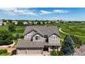 Aerial view of a well-maintained home in a green residential neighborhood at 10533 Redcone Way, Highlands Ranch, CO 80130