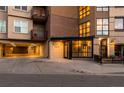 Exterior shot of the River Clay residences showcasing architecture and covered parking garage at 2240 N Clay St # 309, Denver, CO 80211