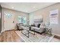 Cozy living room with a neutral color palette and natural light at 175 S Emerson St, Denver, CO 80209