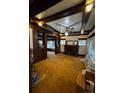 Inviting living room with wood accents, a cozy fireplace, and ample natural light at 1731 E 25Th Ave, Denver, CO 80205