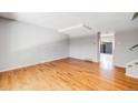 Spacious living room featuring hardwood floors and lots of natural light at 9026 E Mansfield Ave, Denver, CO 80237