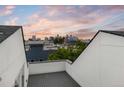 Inviting rooftop deck showcases cityscape views, perfect for entertaining and relaxing outdoors at 2831 W 25Th Ave # 3, Denver, CO 80211