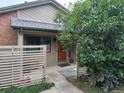 Charming home entrance with a beautiful wood door and well-maintained landscaping at 4009 Wonderland Hill Ave, Boulder, CO 80304