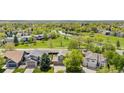 Beautiful neighborhood with a view of the community park with walking paths and a pond at 3418 Elk Ct, Broomfield, CO 80020