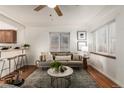 Bright living room with comfy sofa and coffee table at 2028 Perry St, Denver, CO 80212