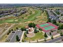 Gorgeous community amenities include tennis courts, playground, and walking trails at 11973 Song Bird Hills St, Parker, CO 80138