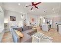Open floor plan featuring the living room connected to the kitchen with modern decor at 3044 Wilson Ct # 2, Denver, CO 80205