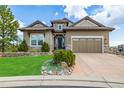 Charming single-Gathering home boasts a well-maintained lawn, mature landscaping, and a spacious three-car garage at 10698 Mountaingate Ct, Littleton, CO 80126