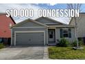 Charming single-story home with a well-maintained lawn and attached garage at 370 Mesa Ave, Brighton, CO 80603