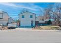 Charming two-story home with a spacious two-car garage and inviting curb appeal at 9120 W Bellwood Pl, Littleton, CO 80123