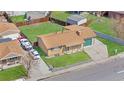An aerial view of the home and neighborhood, showing the yard and surrounding houses at 14441 Maxwell Pl, Denver, CO 80239