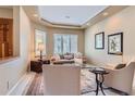 Cozy living room with neutral tones, recessed lighting, and elegant furnishings at 1 Silver Fox Dr, Greenwood Village, CO 80121