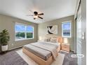 Bedroom showcasing natural light, neutral color palette, and plush carpeting at 2258 Whistler Dr, Longmont, CO 80504